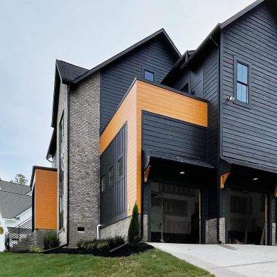 A Side Full View Of A Complete House Painted Professionally In Multi Colors - Lets Upgrade Painting