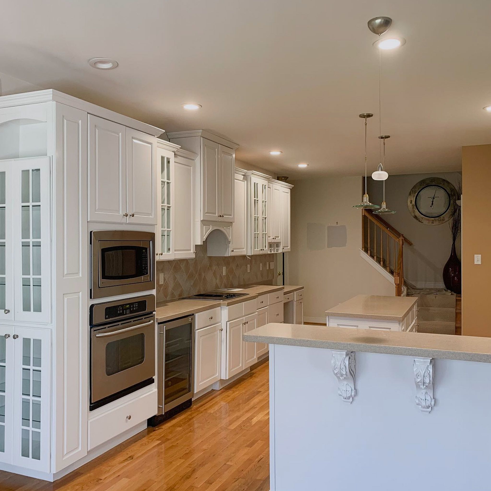 Kitchen Cabinet Refinishing With Fresh Coated Cabinets In White