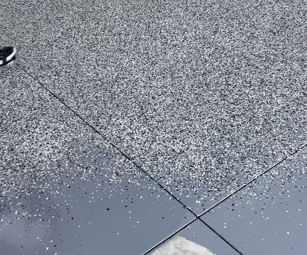 Epoxy Flake Floor Coating In Progress
