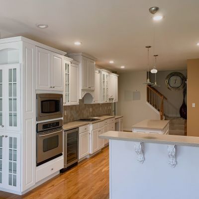 Kitchen Cabinet Refinishing With Fresh Coated Cabinets In White