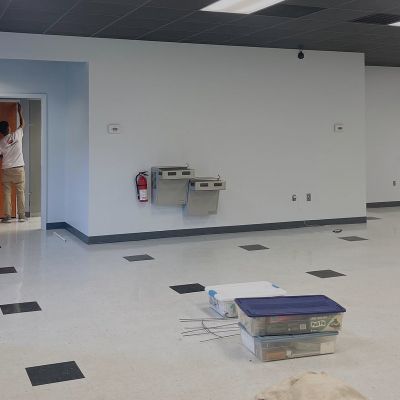 Commercial Kitchen After Repainting By The Let's Upgrade Painting Team